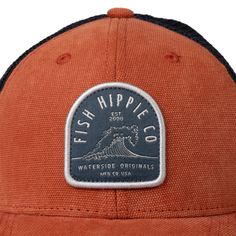 Fish Hippie 100% cotton trucker hat offer in agave and brick colors Red Cotton Trucker Hat, Orange 5-panel Casual Hat, Casual Orange 5-panel Hat, Cotton Trucker Hat With Curved Bill, Orange Curved Brim Trucker Hat, Brown Cotton Trucker Hat With Logo Patch, Casual Orange Trucker Hat For Outdoor, Orange Curved Brim Trucker Hat For Outdoor, Brown Cotton Trucker Hat