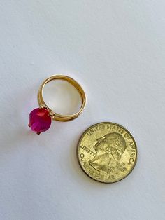 "This is a vintage 14K yellow gold and large, marquise-cut pink gemstone statement ring. Material(s): 14K yellow gold + (1) large marquise-cut pink gemstone Weight: 4.6 grams Flaws (if any): None to mention Marking(s): None to mention (But this ring has been tested and confirmed \"14K\" gold) BAND SIZE 6 3/4 (or 6.75) U.S." Gold Marquise-cut Ruby Jewelry, Gold Ruby Marquise Cut Jewelry, Gold Marquise Cut Ruby Jewelry, Gold Ruby Jewelry With Marquise Cut, Luxury Marquise Ruby Gold Jewelry, Pink 14k Gold Pear-shaped Jewelry, Pink Pear-shaped 14k Gold Jewelry, Gold Faceted Ruby Ring, 14k Stamped Oval Pink Jewelry