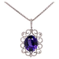 This stunning tanzanite is set in a gorgeous, symmetrical diamond setting that further highlights the top quality tanzanite. The meticulous details involved in this setting truly catches everyone's attention. Tanzanite: 18.80 cts, Oval shape Diamonds: 1.53 cts, Round Brilliant Metal: 18k White Gold **Comes with a 14k White Gold Chain 16 inch length*** Tanzanite Pendant, Diamond Rings Design, White Gold Chain, Key Jewelry, Tanzanite Diamond, Diamond Settings, Expensive Jewelry, Jewelry Lookbook, Girly Jewelry