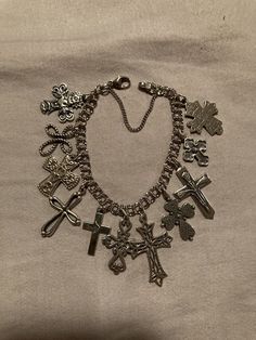 Beautiful James Avery Charm Bracelet with 11 cross charms. All but 2 are retired. Please message for additional info! Spiritual Silver Cross Charm Bracelet, Spiritual Silver Charm Bracelet With Cross, James Avery Charm Bracelet, James Avery Charm, James Avery Charms, James Avery, Fine Jewelry Bracelets, Cross Charms, Bracelets And Charms