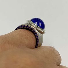 For Sale on 1stDibs - Diamond Tanzanite 18 Karat White Gold Kaleidoscope Enamel Ring Please take a look at one of our trade mark texture in Kaleidoscope Collection - 'The Rhombus'. Buying Gold, Trade Mark, Enamel Ring, Cocktail Rings, Take A, Look At, Rings For Men, Wedding Rings, White Gold