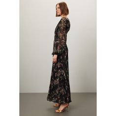 Black floral chiffon (100% Silk). A-line. Long sleeves. V-neck. Back zipper closure. 60" from shoulder to hemline. Imported. Floral Print Maxi Chiffon Evening Dress, Evening Floral Print Maxi Chiffon Dress, Flowy Floral Print Chiffon Evening Dress, Flowy Chiffon Floral Print Evening Dress, Floral Print Maxi Dress For Fall Cocktail, Fall Floral Print Maxi Cocktail Dress, Chic Floral V-neck Dress For Formal Occasions, Fall Floral Print Maxi Dress For Cocktail, Fall Cocktail Maxi Dress With Floral Print