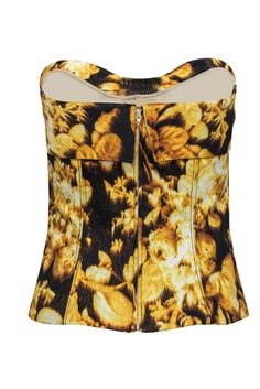 Rock some fab flower power with this darling top from Carolina Herrera! Made in a sultry bustier style with a bright and bold floral print and adorable bow, this statement piece is perfect for all your warm weather excursions. Whether you're headed downtown for brunch or mingling at a backyard soiree, pair this beauty with a flare skirt and woven wedges and you'll be looking classically chic! Size 4 Shell: 97% Cotton, 3% Spandex Lining: 100% Silk Made in USA Concealed back zipper Lined Bustier-s Strapless Tops With Corset Back For Spring, Strapless Spring Tops With Corset Back, Spring Overbust Corset For Night Out, Chic Sleeveless Floral Print Corset, Floral Print Fitted Corset, Strapless Floral Print Corset For Spring, Strapless Floral Corset For Spring, Spring Strapless Boned Bodice Tops, Strapless Tops With Boned Bodice For Spring