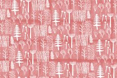 a pink and white pattern with trees on it