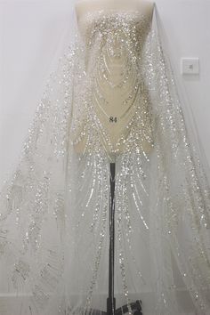 a dress on a mannequin with sequins