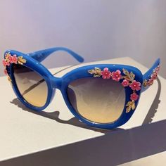 New Retro 50's Blue Flower Accented Cat's Eye Sunglasses Gorgeous And Girly Vintage Mcm Style Sunglasses. Blue Acetate Frames With Pink And Gold Enamel Floral Accents. Brand New. Measurements In Photos New To Poshmark? Use Code Emmiesbling For $10 Off Your First Order! Tags: Retro Vintage Rare Unique 80’s Aj Morgan Groovy Pieces 70’s Trendy Vogue Kourtney Kardashian Kendall Jenner Unisex Gorgeous Old Hollywood Lenses Glasses Sun Summer Elton John Harry Styles Gold Vtg Rare Vintage Unique Cool Sp Y2k Glasses, Glasses Sun, Mcm Style, Black Aviators, Style Sunglasses, New Retro, Boutique Accessories, Kourtney Kardashian, Gold Enamel