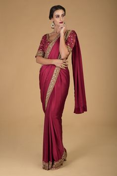 Maroon saree with floral zardozi border. Paired with embroidered blouse.
Component: 2
Embroidered
Neckline: Round
Sleeve Length: Half
Fabric: Pure Satin Silk
Color: Maroon
U neck at the back
Hook closure at the back - Aza Fashions Zardozi Border, Maroon Saree, Sarees Silk, Embroidered Saree, Blouse For Women, Embroidered Neckline, Satin Silk, Saree With Blouse, Blouse Online