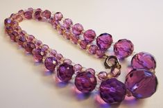 VINTAGE CZECH CUT CRYSTAL ROUND PURPLE BEADS NECKLACE Purple Beaded Costume Jewelry Necklace, Elegant Necklace With Large Czech Glass Beads, Purple Beaded Long Necklace, Long Purple Beaded Necklaces, Purple Long Necklace With Colorful Beads, Elegant Faceted Purple Crystal Necklace, Elegant Purple Necklace With Large Beads, Elegant Purple Faceted Crystal Necklace, Vintage Round Beaded Crystal Necklaces