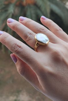 "📣BUY 2 (or more) GET 50% DISCOUNT ON THE WHOLE STORE! Gorgeous freshwater pearl. Adjustable Ring. With your unique ring, enjoy the simplicity and feel primitiveness on your skin. Feel the nature and uniqueness! Perfect for brides, bridesmaids, and special occasions. *Since it is a freeform pearl, will differ in shape. Details: * Finish: 24k gold-filled * Metal: Brass * Handmade item-From Turkey * All Jewelry comes in cute packaging ready for giving ♥ To include a gift message: in cart select \ Handmade Oval Pearl Ring For Anniversary, Gold Oval Pearl Ring For Wedding, Pearl Open Ring For Wedding, Oval Pearl Drop Ring For Anniversary, Open Pearl Ring For Wedding, White Oval Pearl Ring For Wedding, Unique Gold Oval Pearl Ring, Handmade Pearl Open Ring For Anniversary, Baroque Pearl Gemstone Jewelry For Wedding