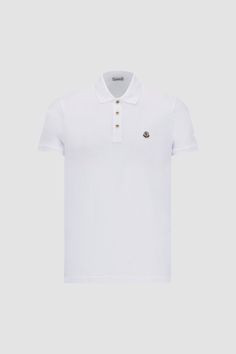 A timeless design that transcends seasons, this polo shirt is crafted from cotton piquet. The classic style is embellished with a logo patch on the chest. Designer Cotton Polo Shirt, Luxury Cotton Short Sleeve Polo Shirt, Designer Fitted Polo Shirt With Polo Collar, Designer Cotton Polo Shirt With Embroidered Logo, Luxury Fitted White Polo Shirt, Luxury Polo Collar Top With Embroidered Logo, Luxury Fitted Polo Shirt With Ribbed Collar, Luxury Cotton Polo Shirt, Luxury Cotton Polo Collar Top