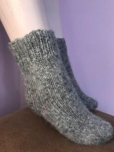 Handknit socks They are made with 50% mohair . Soft and warm. Size 9US Comfortable Knitted Gray Socks, Cozy Soft Gray Socks, Comfortable Thick Knitted Socks, Comfortable Warm Socks, One Size, Comfortable Warm Socks One Size, Warm Comfortable Socks One Size, Warm Comfortable One Size Socks, Soft Gray Winter Socks, Comfortable Hand Knitted Winter Socks