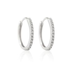 description These 14K Solid White Gold small hoop earrings are made with ethically sourced Real Diamonds end description materials 14K Solid White Gold Carat weight: 0.4cts Clarity: SI 1- 2 Hypoallergenic, lead and nickel free end materials details Thickness 1.4mm Inside Diameter 10mm Snap closure end details sku #ED013 end sku Small Diamond Hoop Earrings, Gold Small Hoop Earrings, Classic Diamond Earrings, Diamond Earrings Wedding, White Gold Hoop Earrings, Diamond Jewelry Earrings, Silver Diamond Jewelry, Silver Diamond Earrings, White Gold Hoops