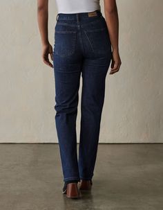 Timeless style and comfort. Crafted from 11.1oz denim in an indigo medium wash, this jean has subtle stretch and a soft classic hand-feel. With a hi-rise waist and straight fit through the leg, they offer a flattering silhouette for everyday wear. We're going back to basics with details; traditional 5-pocket jean styling and contrast color stitching. Perfect for any occasion and can be paired with your favorite tops and shoes to take on whatever your day brings. Straight Fit Denim Bottoms, Dark Wash Straight Jeans With Five Pockets, Straight Fit Denim Blue Jeans, Dark Wash Straight Cropped Mom Jeans, Dark Wash Straight Silhouette Denim Jeans, Fitted Straight Silhouette Denim Jeans, Relaxed Fit Straight Leg Denim Blue Jeans, Dark Wash Straight Denim Jeans, Everyday Jeans With Relaxed Fit, Straight Silhouette