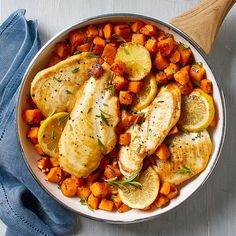 chicken, potatoes and carrots in a white bowl