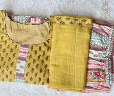 Pure handloom straight cut soft cotton top with soft cotton dupatta and printed soft cotton bottom. Length of the top:44 Inches Chest Size:34 Inches Waist size:32 Inches Pant length:38 Inches Multicolor Printed Palazzo Set For Navratri, Navratri Multicolor Printed Palazzo Set, Bohemian Yellow Palazzo Set With Printed Motifs, Yellow Bohemian Palazzo Set With Printed Motifs, Unstitched Multicolor Cotton Silk Palazzo Set, Multicolor Unstitched Cotton Silk Palazzo Set, Yellow Cotton Silk Sets With Printed Motifs, Yellow Printed Cotton Silk Sets, Yellow Chanderi Palazzo Set With Printed Motifs