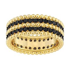 black and gold stacking rings with beads on each ring, set against a white background