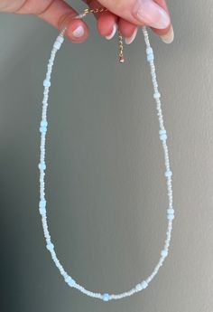 Handmade necklace great for every day wear! Bead sizes: - blue: 4-5mm - white: 2mm Everyday White Single Strand Necklace, Everyday White Single Strand Beaded Necklace, Blue Beaded Everyday Necklace, Light Blue Single Strand Necklace With Round Beads, Everyday Handmade White Necklace, Light Blue Round Bead Necklaces For The Beach, Minimalist Pearl White Beaded Necklaces, Everyday Blue Beaded Necklace With Tiny Beads, White Necklace With Colorful Beads For Everyday