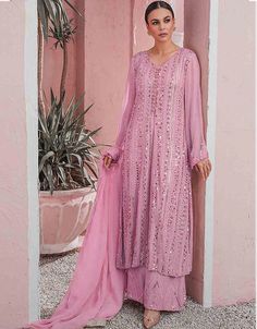 Rose Pink Sharara style Suit Faux Georgette Salwar Kameez in Embroidery, Sequins & Lace Work:Arabic Attire #salwarkameezimage #salwarkameezstore #salwarset #churidarsuitdesign #indiansalwarsuitsdesigns #trendysuitsforladies #salwarkammez #suitsinindia #newindiansuits #buysalwarsuitsonline #indiansalwarkameezonlinefreeshipping #designersalwarkameezonlineusa #designersalwars #newshalwarkameezdesign Green Sharara, Georgette Palazzo, Shoes Guide, Palazzo Style, Latest Salwar Kameez, Punjabi Outfits, Georgette Dupatta, Georgette Tops, Desi Wear