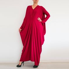 "Oversized draped maxi dress. Relaxed fit. Interesting design. Long sleeves Perfect for plus sizes The color on the photos is Apple Green color from our color chart. The model is 155cm tall and size L/XL. The dress has 3/4 sleeves. The dress is made to order. It can be made in all sizes, including plus sizes. I will need the length from the shoulder to the bottom hem or your total height. -------------------------- This garment is available in XS-3XL sizes Every garment is made for 170 cm (5\"8' Elegant Oversized V-neck Maxi Dress, Summer Flowy Long Sleeve Abaya, Summer Long Sleeve Flowy Abaya, Flowy Long Sleeve Summer Abaya, Flowy Summer Abaya, Spring Maxi Dress With Batwing Sleeve And Flowy Fit, Spring Maxi Dress With Batwing Sleeves, Spring Flowy Maxi Dress With Batwing Sleeves, Spring Maxi Length Abaya