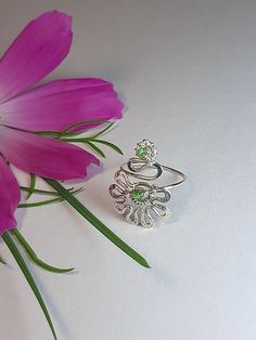 Flower toe ring. Delicate ring for fingers or toes--petite flower. Versatile and fun. Wear it as a foot ring with flip-flops or strappy heels. Wear it as a midi ring between your knuckles. Wear it folded and mixed with other rings to create new combinations. Choice of silver or bronze finish. Perfect little gift. The ring is made in Wire wrap technique, elements of coinage, from silver 925, copper or bronze wire with natural rhodochrosite, turquoise, malachite, and also you can order the ring with other stones, pre-negotiate with me. The ring is artificially aged chemically, polished and coated with protective varnish. The ring size is adjustable.  In the package You will receive one ring for the toe, which select from the options. Pay attention If You like thicker and more powerful rings, Adjustable Crystal Flower Ring, Adjustable Flower Crystal Ring, Unique Adjustable Flower-shaped Jewelry, Adjustable Flower Crystal Ring For Gift, Adjustable Flower Crystal Ring Gift, Adjustable Nickel-free Toe Rings As Gift, Adjustable Flower Shaped Ring Perfect For Gift, Adjustable Rings For Spring Promise Ring, Green Toe Ring For Promise