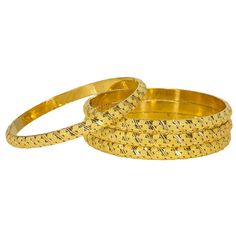 Add beautifully accented 22K gold to your jewelry collection with this set of six bangles from Virani Jewelers!Features: Radiant 22K hollow domed gold bands Stunning slanted gold accents around the entire band Rounded edges for a comfortable fit Wear them individually, or stacked on one wrist for a classic look If you’re looking for the best in 22K gold jewelry, then you need this set of yellow gold bangles from Virani Jewelers! Featuring gorgeous details and stunning slanted accents that you’ll Gold Bangles Set Of 6, Gold Bangles Set, Gold Bangle Set, 22k Gold Jewelry, Bangles Set, Yellow Gold Bangle, Gold Bead Necklace, Bangle Set, 22k Gold