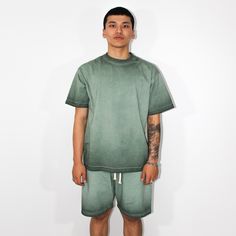 Galore Garments Collection: 250GSM Oversized T-shirt in Acid Wash Forest Green. Crafted from high-quality 250GSM fabric, this unisex tee offers a slightly oversized fit that fits beautifully on any body type. Enhanced with a acid wash, it exudes a vintage charm that makes it an instant wardrobe staple. See shipping and Size Guide below. Made-to-Order. Green Urban T-shirt For Summer, Green Sporty T-shirt With Relaxed Fit, Green Washed T-shirt For Streetwear, Green Relaxed Fit Casual T-shirt, Casual Green T-shirt With Relaxed Fit, Green Crew Neck T-shirt For Streetwear, Green Cotton T-shirt For Streetwear, Green Sporty Top With Drop Shoulder, Sporty Green Top With Drop Shoulder