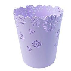 a purple cup that has flowers on it