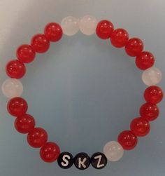 Handmade Bracelet to show support for the KPOP Boy Group Stray Kids! Personalized Red Trendy Beaded Bracelets, Trendy Red Wristband For Gift, Customized Red Casual Jewelry, Customized Casual Red Jewelry, Casual Customized Red Jewelry, Casual Red Customized Jewelry, Trendy Red Personalized Beaded Bracelets, Trendy Personalized Red Beaded Bracelets, Customized Red Wristband For Friendship