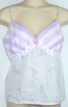 Vintage Ann Taylor cotton summer top vintage stock, never worn 100 percent cotton adjustable pink ribbon spaghetti straps Flat floral motifs in pink and lilac elasticized back  size  L measurements: 33 inch under bust circumference 16 inches overall length excluding 5 inch strap drop gorgeous!! Spring Pink Camisole With Straps, Pink Camisole With Straps For Spring, Feminine Cotton Camisole For Beach, Lavender Cotton Summer Tops, Summer Lavender Cotton Tops, Feminine Cotton Camisole For Vacation, Spring Cotton Camisole With Straps, Pink Spring Camisole, Casual Pink Camisole With Delicate Straps