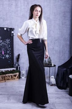 - Long taffeta skirt- High waist silhouette design- Silk top with a bow tie- 25+ colors of silk Model wears size US 8, she is 180 cm tallPlease, use this size chart to select your sizeUS 0 >>> Bust 82 cm (32.5 inches) Waist 64 cm (25 inches) Hips 89 cm (35 inches)US 2 >>> Bust 85 cm (33.5 inches) Waist 66 cm (26 inches) Hips 92 cm (36 inches)US 4 >>> Bust 88 cm (34.5 inches) Waist 68 cm (27 inches) Hips 94 cm (37 inches) US 6 >>> Bust 90 cm (35.5 inches) Waist Elegant Formal Maxi Skirt With Gathered Detail, Elegant Fitted Maxi Skirt For Formal Occasions, Elegant Formal Fitted Maxi Skirt, Formal Gathered Flared Skirt, Elegant Black Maxi Skirt For Office, Formal Fitted Maxi Skirt With Gathered Detail, Elegant Black Gathered Maxi Skirt, Formal Long Pleated Pencil Skirt, Formal Pleated Skirt