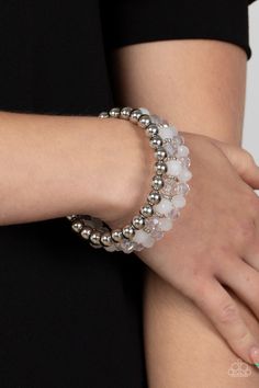 Sections of shiny silver beads and an alternating pattern of opaque and glittery white rhinestone gems gradually increase in size along a coiled wire, creating a jaw-dropping infinity wrap bracelet around the wrist.

 Sold as one individual bracelet. Trendy Fringe, Infinity Wrap, Coil Bracelet, Black Order, White Bracelet, Mixed Metal Jewelry, White Bracelets, Paparazzi Accessories, White Rhinestone