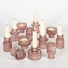 a group of candles sitting next to each other