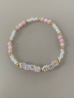 -baby pink and gold combination bracelet. -Personalize what you would like the letters to say! -One bracelet sold for each order. Order more bracelets to stack! Check out the other designs we include! -Gold beads are made with 14k gold plated beads. -Each bracelet comes with a sunset stamped charm If you have a color combination you would like that you don't see, message me and we can see if I can fulfill the request based on materials! Cheap Pink Bracelets With Custom Name, Cheap Adjustable Pink Name Bracelet, Customizable Pink Bracelet Jewelry, Pink Beaded Name Bracelet For Birthday, Adjustable Pink Bracelets With Letter Beads, Trendy Pink Beaded Bracelets With Letter Print, Cute Personalized Gold Stretch Bracelet, Personalized Pink Beaded Bracelets With Name, Personalized Cute Gold Beaded Bracelets