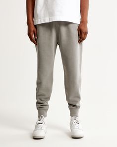 Comfortable joggers in our softAF fleece fabric and relaxed-fit silhouette with exterior drawcords, ribbed cuffs, side pockets and one back pocket for plenty of storage. Male Features, Pocket Craft, Grey Joggers, Grey Material, Mens Joggers, Mens Essentials, Jogger Sweatpants, Back Pocket, Casual Wardrobe