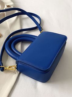 Bag For Love - Minimalist Double Handle Flap Square Bag - Women Satchels Product Description Color Blue Strap Type Chain Strap Type Top Handle Pattern Type Plain Style Fashionable Bag Size Medium Quantity 1 piece Type Square Bag Composition 100% Polyurethane Material PU Leather Size Chart INCH CM Size Bag Width Bag Height Bag Length Strap Length one-size 2.6 3.9 6.3 47.2 Size Bag Width Bag Height Bag Length Strap Length one-size 6.5 10 16 120 Similar Products h2 { text-align: center; } .red-box Inch Bag, Plain Style, Square Bag, Olivia Mark, Chain Strap, Top Handle, Bags Women, Fashion Bags, 1 Piece