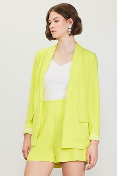 The Top Notch Boyfriend Blazer in yellow?! A statement piece for spring. This fit? A CLASSIC. It has so many great details like working pockets, straight sleeves and a notched collar. Blazers are always sooo chic and this one has the perfect cool girl touch. -Relaxed fit blazer-- straight,, easy fit-Longer length hits at just the right spot-Curved lapel-Open style front-- tres chic-Small shoulder pads for structure-Full length-Fully lined and delicious quality XSmall: 2-4, Small: 4-6, Medium: 8- Spring Chic Blazer With Lapel Collar, Chic Green Blazer For Spring, Chic Spring Blazer With Lapel Collar, Trendy Summer Blazer For Day Out, Trendy Green Spring Blazer, Spring Business Casual Blazer In Solid Color, Solid Color Blazer For Spring Workwear, Solid Color Blazer For Work In Spring, Trendy Summer Outerwear With Lapel Collar