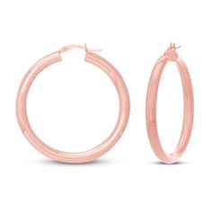 Elegant and essential, these women's round hoop earrings compliment any look, at any time of year. Crafted in 14K rose gold, the hoop earrings secure in place with snap-lock backs. Rose Gold Hoop Earrings For Anniversary, Rose Gold Shiny Hoop Earrings, Modern Hypoallergenic Rose Gold Hoop Earrings, Rose Gold Hoop Earrings With Shiny Finish, Hypoallergenic Rose Gold Hoop Earrings, Hypoallergenic Rose Gold Round Hoop Earrings, Rose Gold Hoop Earrings Shiny Finish, Rose Gold Hoop Earrings With Polished Finish, Rose Gold Polished Hoop Earrings