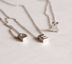 Tiny silver letter necklace - Initial necklace - personalised necklace - Monogram necklace - Name necklace PERSONALIZED Necklace with Matt Rhodium Plated Chain and Tiny Matt rhodium plated Initial-Letter. The listing is for ONE alphabet Necklace. For a minimal look!! This is a beautiful dainty necklace, so cute and delicate, you can wear it alone or stack it with your other necklaces!! If you want 4 or more necklaces contact me for a discount!! ✪ Matt Rhodium Plated Delicate Chain. Length 16.5'' Cheap Silver Letter Initial Necklace, Minimalist Initials Sterling Silver Necklace, Simple Gold-colored Sterling Silver Initial Necklace, Silver Initial Letter Necklace For Birthday, Silver Initial Letter Necklace For Gift, Silver Letter Necklace, Letter Necklace Initials, Letter Necklace Silver, Silver Initial Necklace