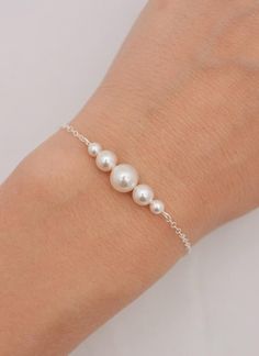 Pretty Jewelry Adjustable Sterling Silver Pearl Drop Bracelet, Sterling Silver Pearl Bracelet As Gift, White Sterling Silver Bracelets For Bridesmaids, White Sterling Silver Bracelet For Bridesmaid Gift, Classic Silver Pearl Bracelet For Bridesmaids, Sterling Silver Bracelets With Pearl Drop And Round Beads, Pearl Drop Sterling Silver Bracelet With Round Beads, Silver Pearl Bracelet For Bridesmaid Gift, Silver Pearl Bracelet For Bridesmaid