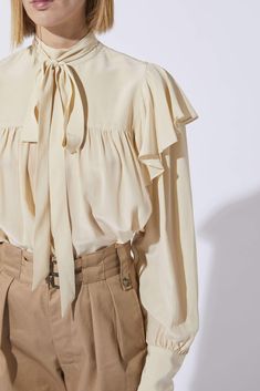 NUTS IVORY RUFFLE BLOUSE — Atelier Boutique Romantic Blouses, Blouse Neck, Pretty Blouses, Loose Blouse, Woven Top, Neck Ruffle, Shakira, High Collar, Fashion Tops