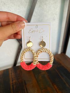 These coral beaded and gold rattan drops earrings are the perfect accessory for the summer season. Crafted with quality handmade beads and rattan, they will bring a splash of color and sparkle to any outfit. Lightweight and comfortable, you can wear these bold earrings all day long. 2.7” Lead and nickel free Summer Beach Beaded Earrings With Dangling Beads, Summer Beach Beaded Earrings, Gold Earrings For Beach Spring Season, Handmade Beaded Drop Earrings For Vacation, Pink Beaded Earrings With Round Beads For Beach, Handmade Beaded Earrings For Beach In Summer, Trendy Dangling Beads Earrings For Beach, Trendy Beach Earrings With Dangling Beads, Trendy Dangle Beaded Earrings For Vacation