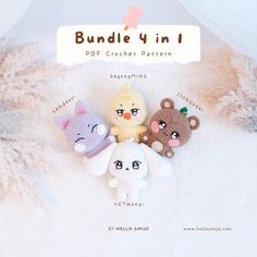 three crocheted stuffed animals sitting next to each other on top of a white blanket