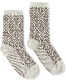 Get that warm and cozy winter feeling for your feet all year long with the Smartwool Everyday Traditional Snowflake Crew Socks. They have full-cushion support and a premium sweater feel. Cozy Knitted Socks For Winter, Cozy Knitted Winter Socks, Scandinavian Style Winter Socks With Fair Isle Pattern, Warm Beige Socks For Winter, Cozy Beige Socks For Winter, Winter Nordic Knitted Socks, Nordic Knitted Winter Socks, Cozy Beige Winter Socks, Warm Beige Winter Socks