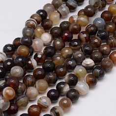 multicolored agate bead strand with white and brown stripes on each strand