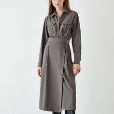 This button-down shirt dress features a professional collar, long puff sleeves, a high split ham and flap front pockets. Available in saddle brown, slate grey and black. No Stretch Medium Weight Regular Fit Fabric: 100% polyester Model is 177cm/5'9" tall, 80cm/31" bust, 59cm/23" waist and 89cm/35" hip and wears a size S. Care Instruction: Machine Wash at or below 30°C, Do not bleach, Line dry in shade, Iron cool (max 110°C), Dry clean, tetrachloroethylene(PCE) only. Workwear Shirt Dress With Placket, Collared Shirt Dress With Placket For Work, Formal Button-up Shirt Dress With Pockets, Belted Shirt Dress For Formal Fall Occasions, Semi-formal Belted Shirt Dress For Fall, Formal Belted Shirt Dress For Fall, Belted Shirt Dress For Semi-formal Fall Occasions, Belted Long Sleeve Shirt Dress For Business, Long Sleeve Belted Shirt Dress For Business