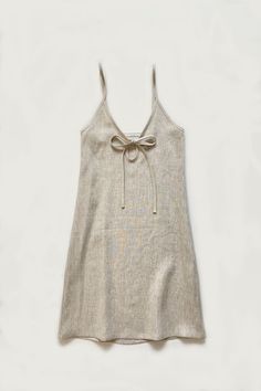 For our take on the 90's classic slip dress   - we bring you the drew dress. the drew is a classic slip dress shape only a little more a-line through the hip. this raw linen slip has a deep v-neck and peep hole at front all topped off with our classic spaghetti bow and we made the straps adjustable for an even better fit! V Neck Slip Dress, Slip Dress Lingerie, Short Slip Dress, Garment Of Praise, Linen Slip Dress, Outfits Fo, Dress Lingerie, How I Met Your Mother, Grad Dresses