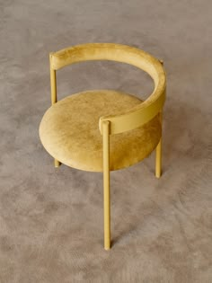 a small round table sitting on top of a carpeted floor