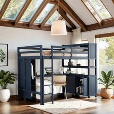 a loft bed with desk underneath it in a room that has wood floors and wooden beams