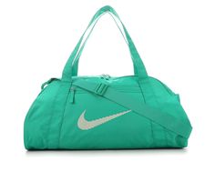 Durable and spacious is the name of the game for Nike's Gym Club Duffel Bag. Crafted with a lightweight and durable construction, this duffel bag features adjustable straps and plenty of storage space so you can always be ready for the day. This product is made with at least 65% recycled polyester fibers, Lightweight and durable ripstop fabric body, Zippered closures, Approx. 13 inch H x 20 inch W x 9 inch D, Removable shoulder strap, Snap pockets on the sides for added convenience, Nike® branding details | Unisex Nike Gym Club Duffel Bag in Stadium Green Sports Nylon Duffle Bag, Functional Green Rectangular Gym Bag, Nylon Gym Bag With Adjustable Strap For Sports, Sporty Everyday Shoulder Bag With Logo, Functional Sports Travel Shoulder Bag, Functional Sports Shoulder Travel Bag, Functional Shoulder Travel Bag For Sports, Sports Bags With Adjustable Strap In Nylon, Nylon Sports Bags With Adjustable Strap