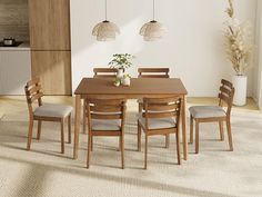 a dining table with four chairs and a plant in the center on top of it